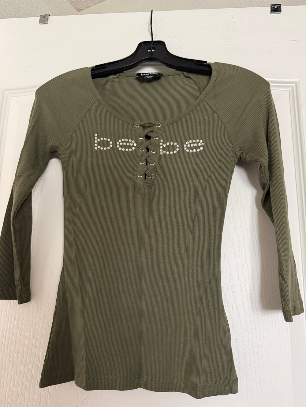 Bebe Olive Ribbed Lace-Up Top with Rhinestone Logo Sz Xs Worn Once.